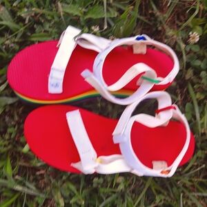 Cutie pie lgbtq rainbow teva sandals (women's 10)